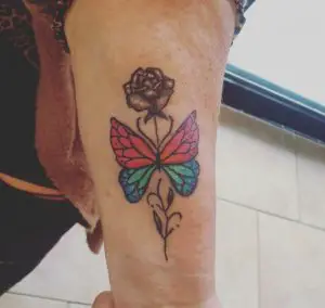 rose and butterfly tattoo