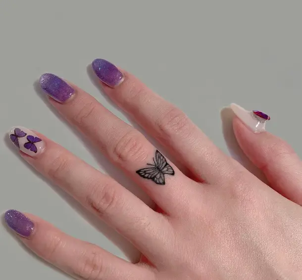 1 Pretty Tiny Finger Butterfly Tattoo
