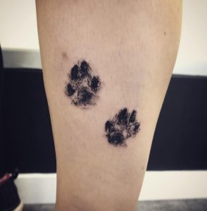 10 Natural Black Ink Designed Chihuahua Paw Tattoo on Leg