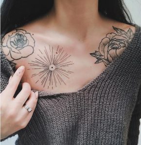 linework Sunburst Tattoo on chest