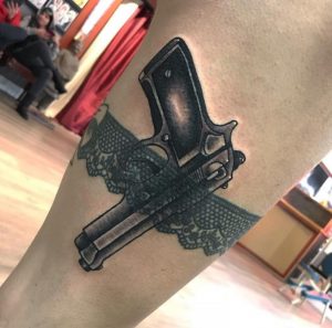 11 Amazing Black Ink 1911 Pistol Tied with Thigh Net Tattoo on Thigh