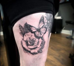11 Back And Gray Inked Rose with Butterfly Tattoo for Female on Thigh
