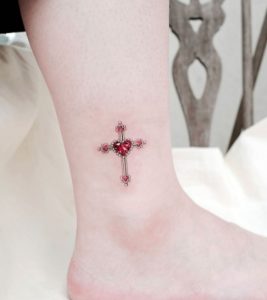 11 Cutest Minimal Heart with Cross Tattoo on Lower Leg and Next to Ankle