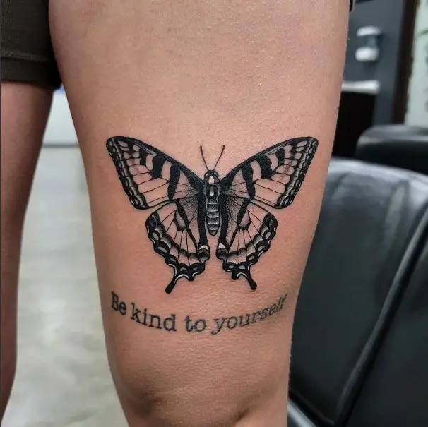 11 Solid Black Ink Outstanding Butterfly Tattoo with Quote on Thigh