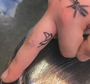 12 Lovely Tiny Ocean Stingray Fish Passionate Tattoo on Finger