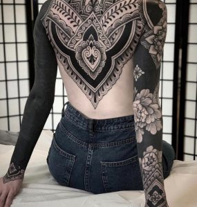 12 insane design Body Suit Tattoo on back both full hands