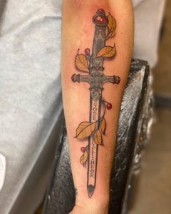 13 Nice Color Ink Gryffindor Dagger Tattoo on Half Sleeve