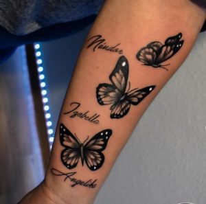 13 Pretty Black Inked Butterflies with Writing Name Tattoo for Pretty Girls Hand