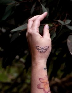 14 Black Line Inked Relax Meaning Butterfly Tattoo on Finger Upper Right Side