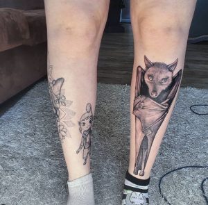 14 Black and Gray Designed Bat Tattoo for Female on the Front Lower leg