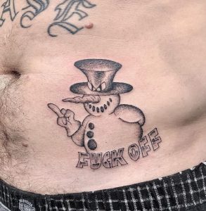 14 Creative Black Ink Killer Snow Tattoo on Belly