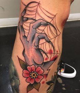 14 Floral Claw Tattoo in Web on Leg