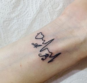 14 Pretty Pulse Tattoo with Tiny Alphabet on Wrist