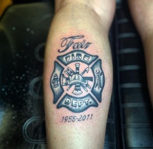 Tribal Fire Department Tattoo on leg