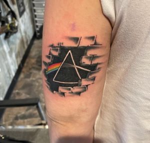 15 Creative Rainbow Tattoo in Triangle Behind The Arm