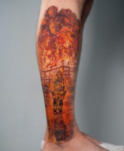 Fire Department with fireman Tattoo on leg