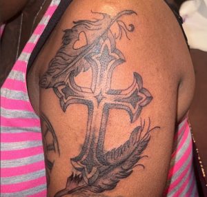 15 Incredible Heart Shape with Cross Tattoo on Lovely Black Skin Arm