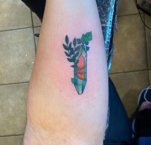 16 Dynamic Crystall Gem Tattoo with Green Leaf on Sleeve