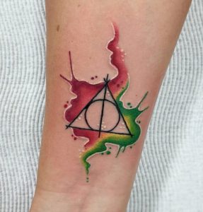 16 Gryffindor Triangle Tattoo on Forearm