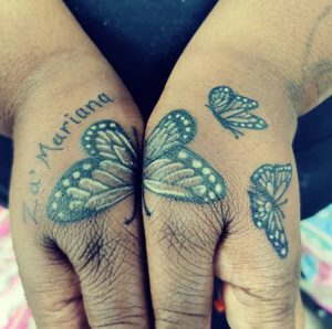16 Outstanding Minimal Butterfly Tattoo within Two Hand Fingers Upper Side