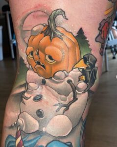 16 Pumpkin Face Snow Tattoo on Leg