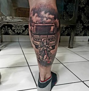 Exhausted Fire Department Tattoo on leg