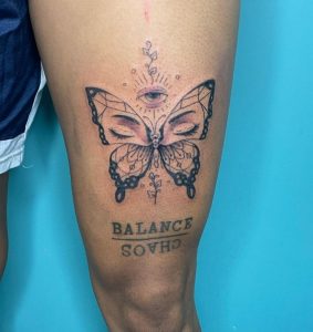 18 Black Gray Ink Butterfly Tattoo with 3 Eyes Quote on Thigh