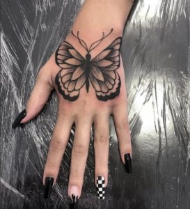 18 Black Ink Matching Butterfly for Night Party Tattoo on Upper Finger Side