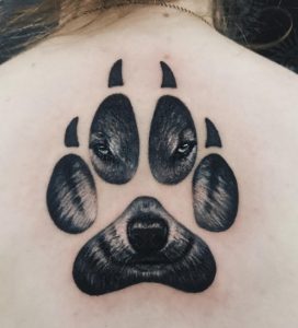 18 Incredible Solid Black ink Wolf Paw Print Claw Tattoo on Back