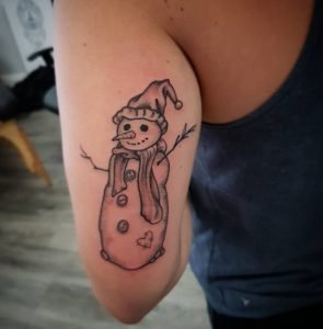 19 Greate illustrative Snowman Tattoo Behind The Arm