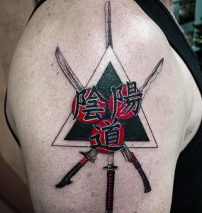 19 Protective Kanji Tattoo on Arm