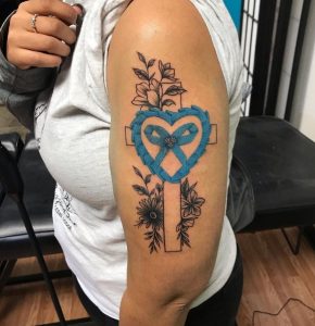 19 Super Artistic Blue Heart with Cross That Covering Flower Tattoo on Half Arm