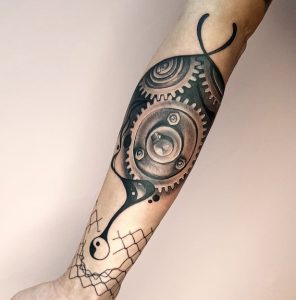 19 Superb Black Ink Art Gear Tattoo Idea on Half Hand