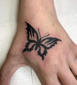 19 Thick Black inked Butterfly Tattoo for Matiching with Friends on Upper Finger Side