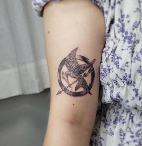 Mockingjay Bird Tattoo for Girl on Bicep Arm