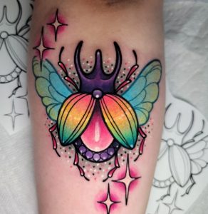 Rainbow Butterfly its on my shoulder so it was a little awkward and didnt  want to ask for help to take the picture xD  rtattoo