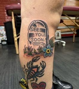 20 Truth Telling Quote in Headstone Tattoo on Half Leg
