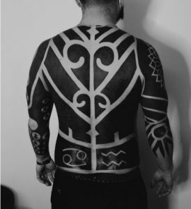 20 full black ink color Body Suit Tattoo on half body