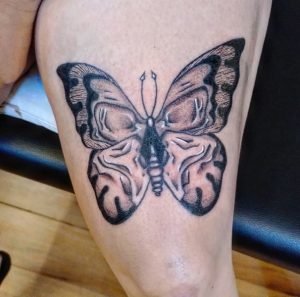 21 Worthy Black Inked Butterfly Tattoo on Thigh