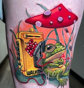 22 Awesome Multicolor Realistic Frog Relaxing Lesting Music Tattoo on Thigh