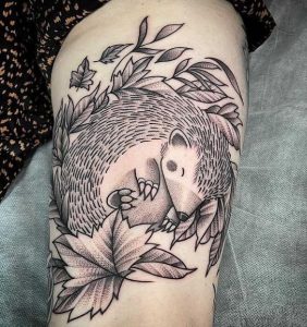 Hedgehog Sleeping Tattoo on Thigh