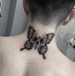 23 Magnifcent Black Inked Big Skull Butterfly on Neck Backside