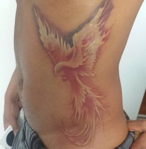 23 Megnificent Color Ink Big Mockingjay Birds Tattoo from Rib to Hip