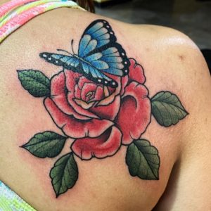 23 Natural Color Ink Designed Red Rose with Green Leaf Blue Butterfly Tattoo on Back Side