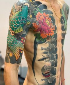 23 multi color flowral Body Suit Tattoo on body and hand
