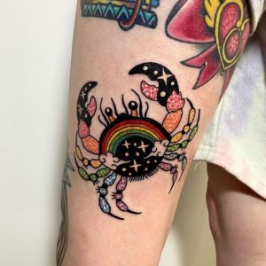 24 Amzing Rainbow Crab Tattoo on Thigh