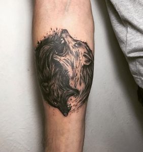 24 Magical Round Design Fenrir Wolf Tattoo on Forearm