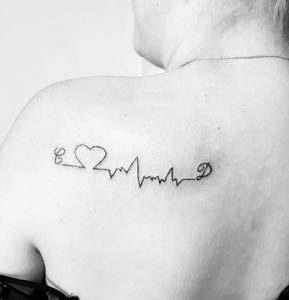 24 Simple Black Ink Pulse Tattoo on Back