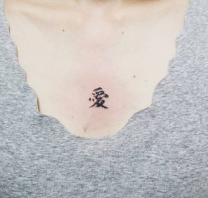 Kanji Chest Tattoo for Women