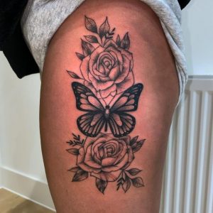 25 Super Designed Rose with Butterfly Tattoo on Thigh